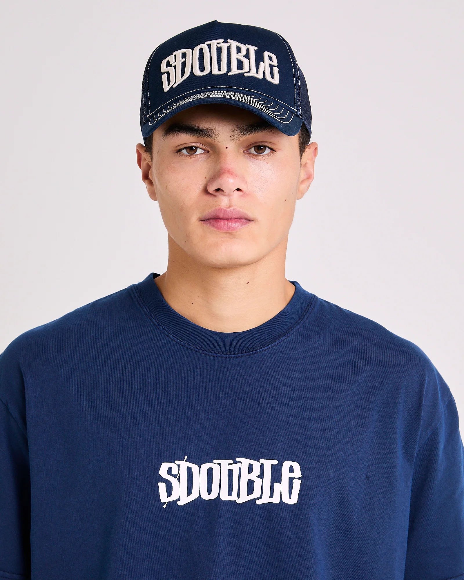 Mid-Block Curved Peak Trucker Cap