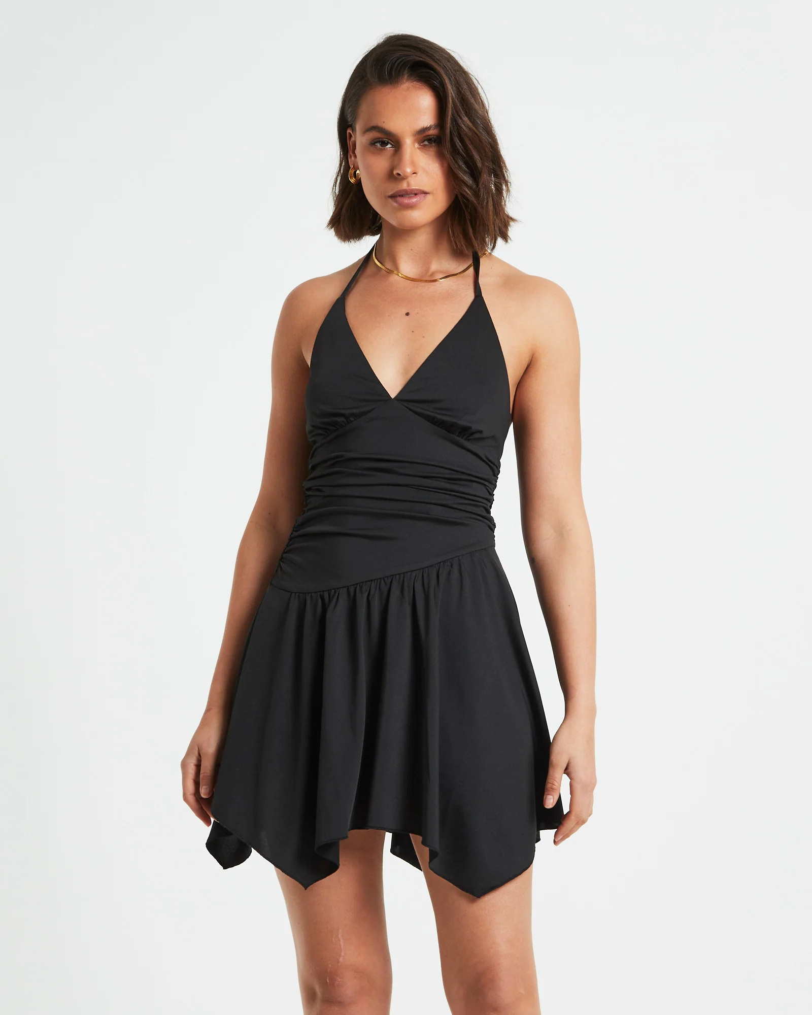 Sawyer Asymetric Hem Halter Mini Dress in Black